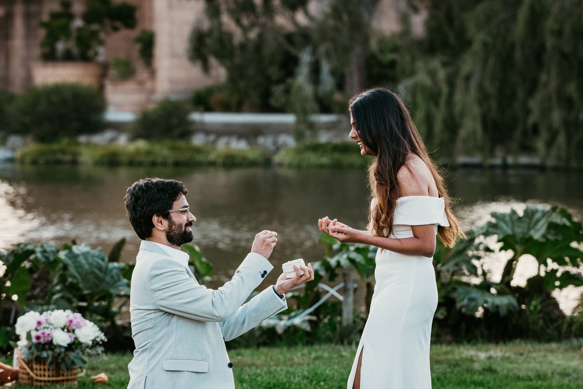 Proposal moment captured in a garden setting