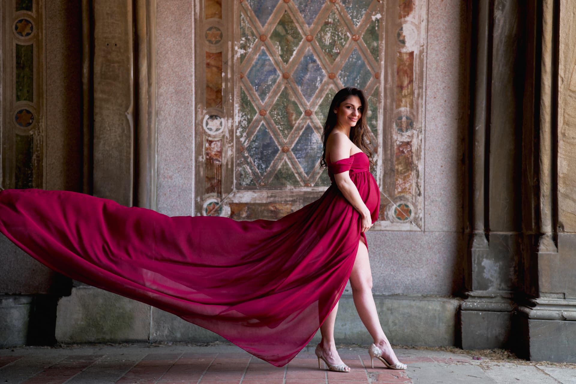 Editorial maternity portrait with dramatic gown