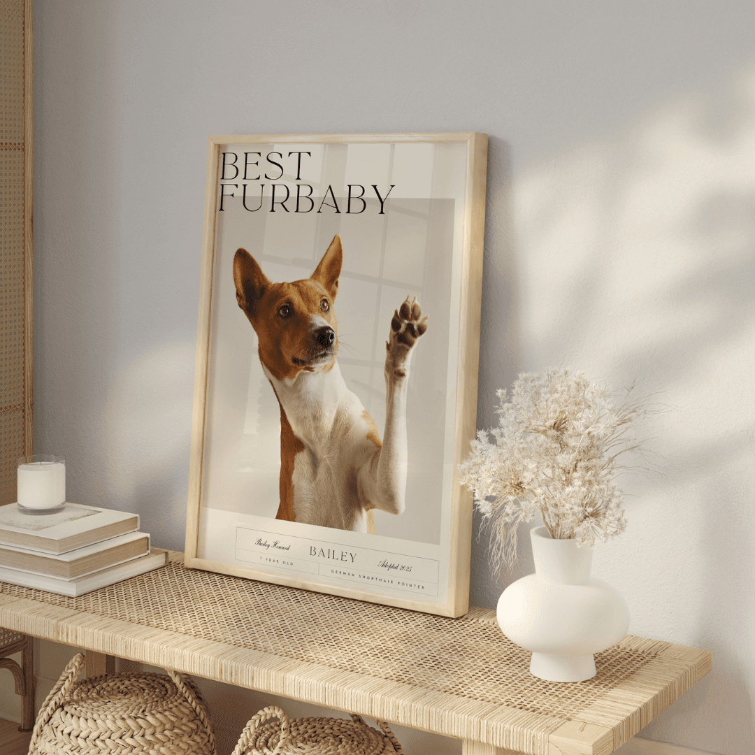 Paper Culture framed family print displayed on a wooden table beside a vase