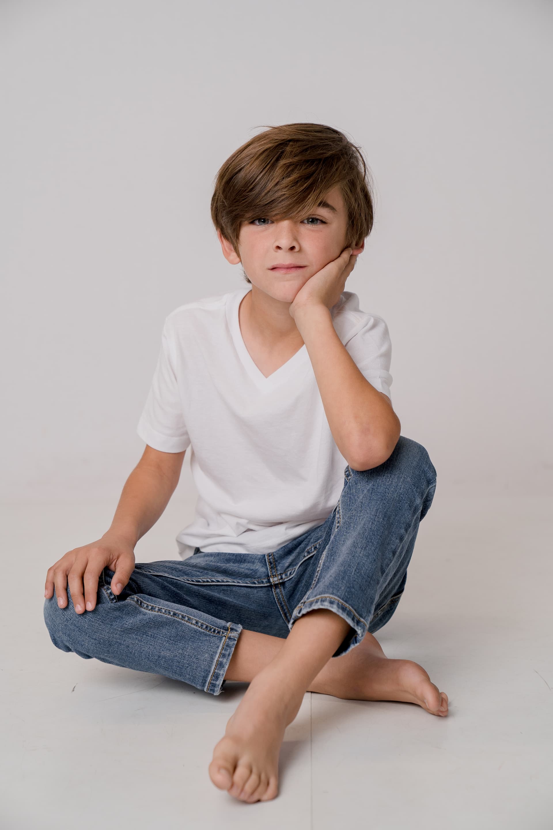 Boy sitting cross-legged