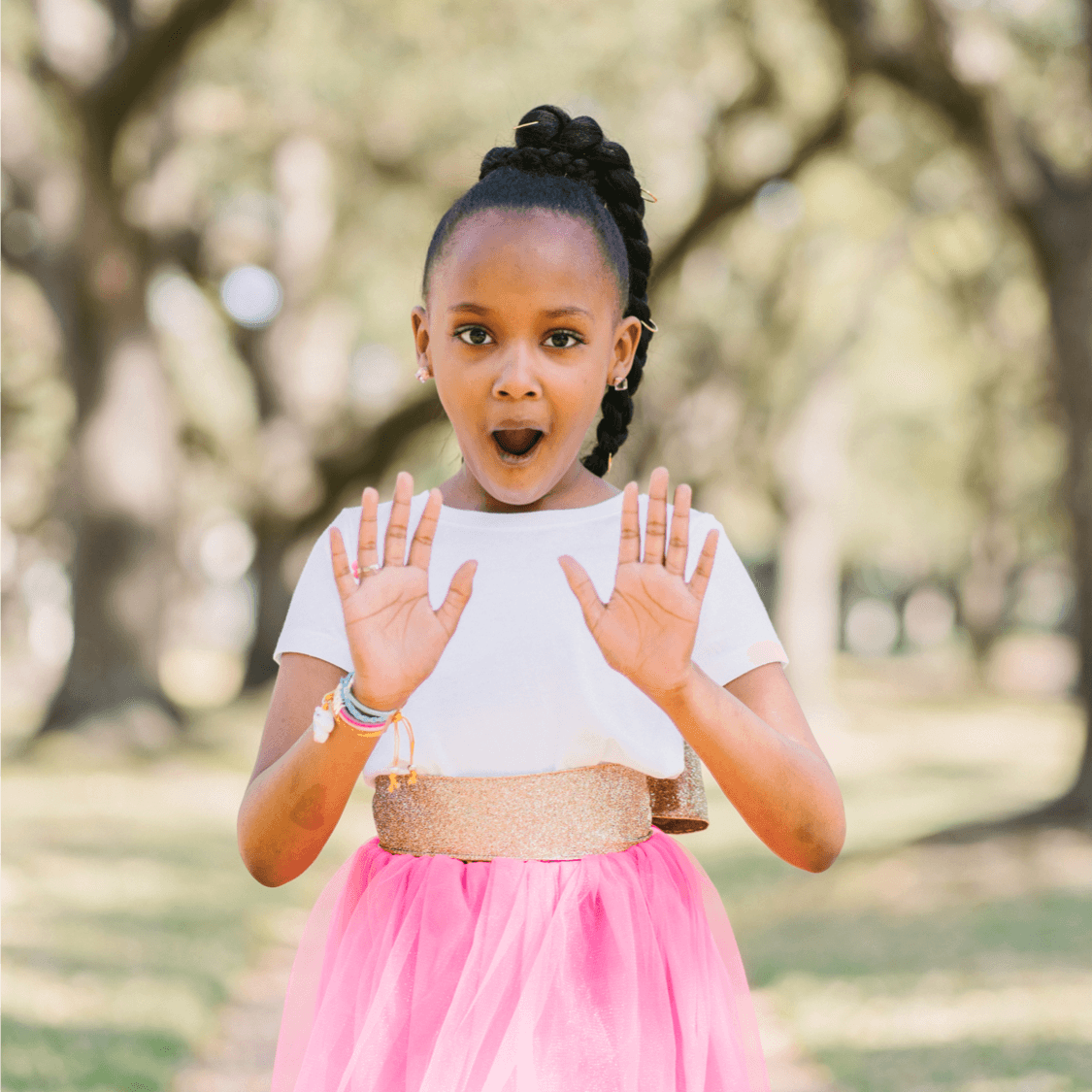 Girl showing hands in surprise