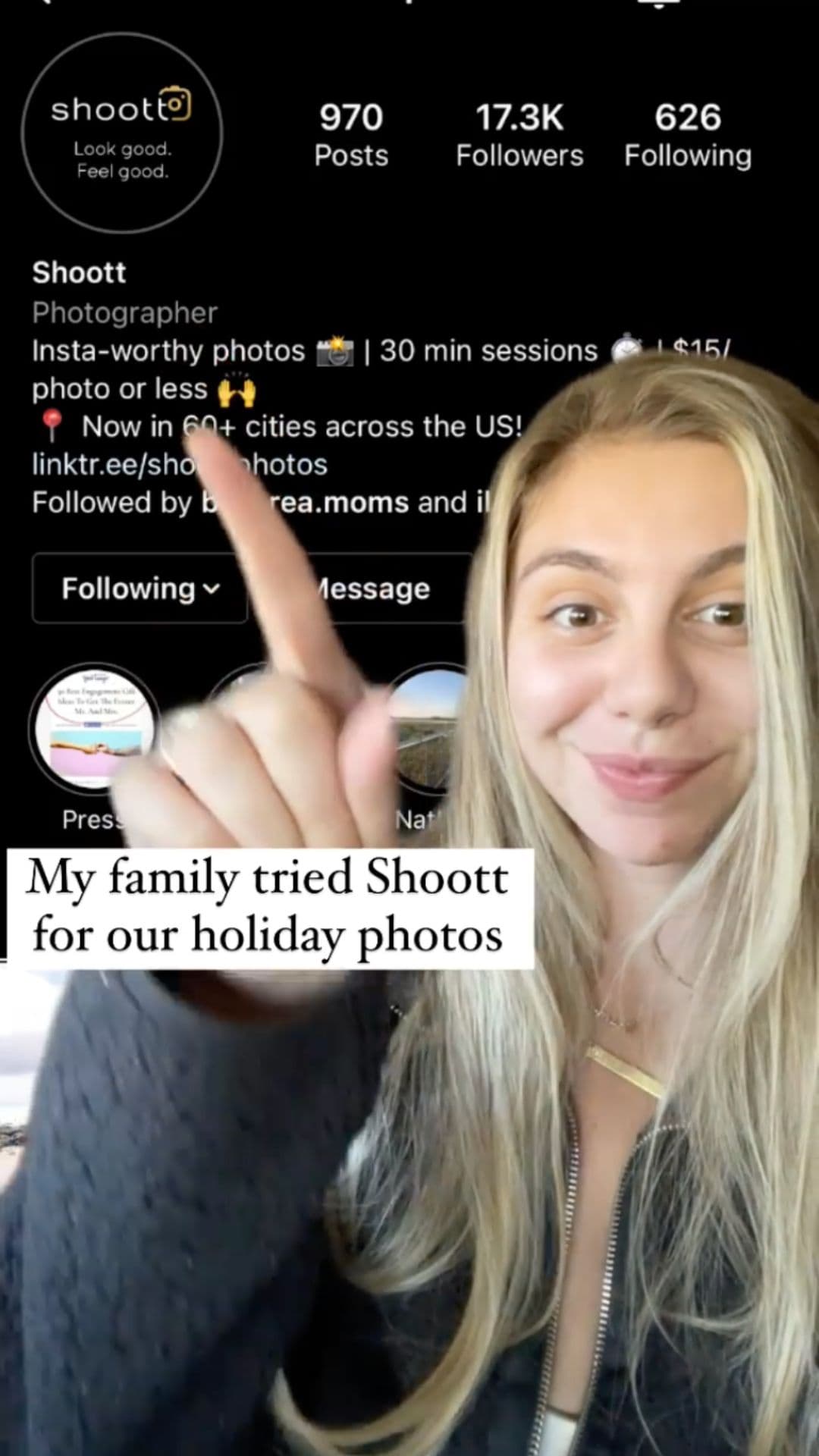 Woman pointing to a social media profile on her smartphone screen.