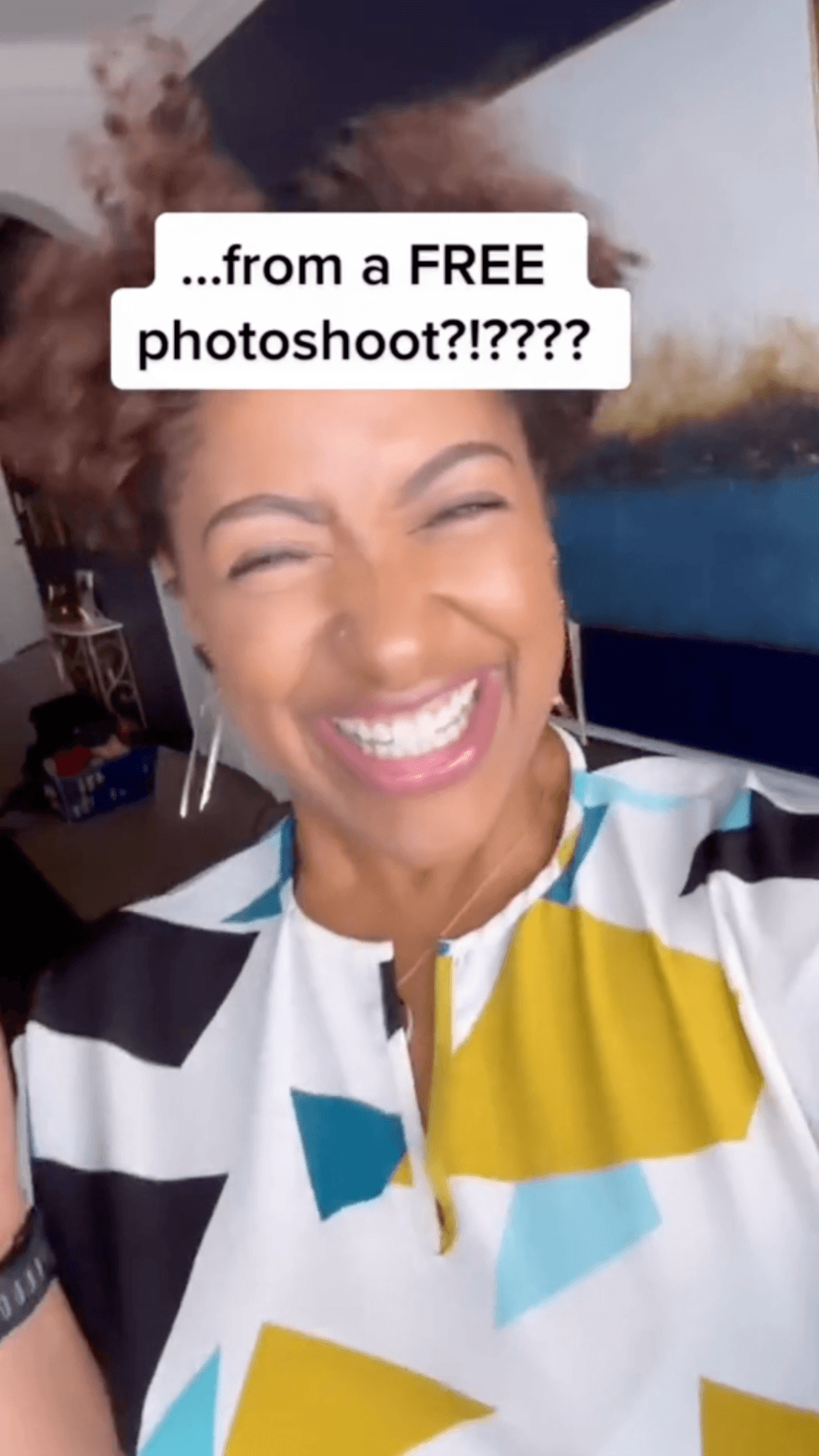 A woman laughing with text overlaid that reads "...from a FREE photoshoot!????".