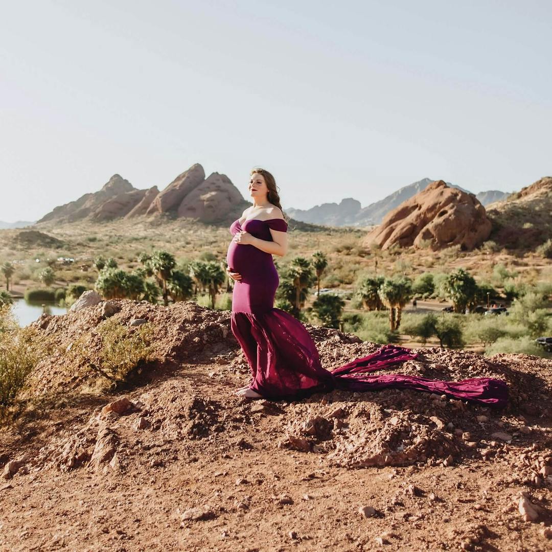 pregnant woman in rocky terrain