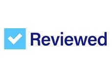 Logo of 'Reviewed' with a blue checkmark