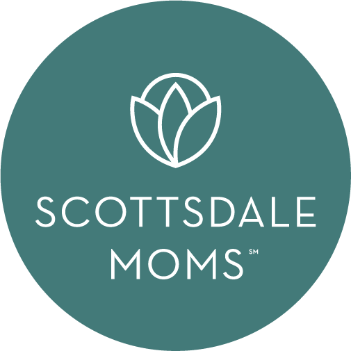 Logo of Scottsdale Moms with mint green background and white text and leaf symbol.