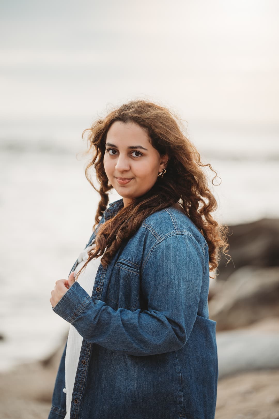 High school senior at golden hour in a park by a Shoott photographer.